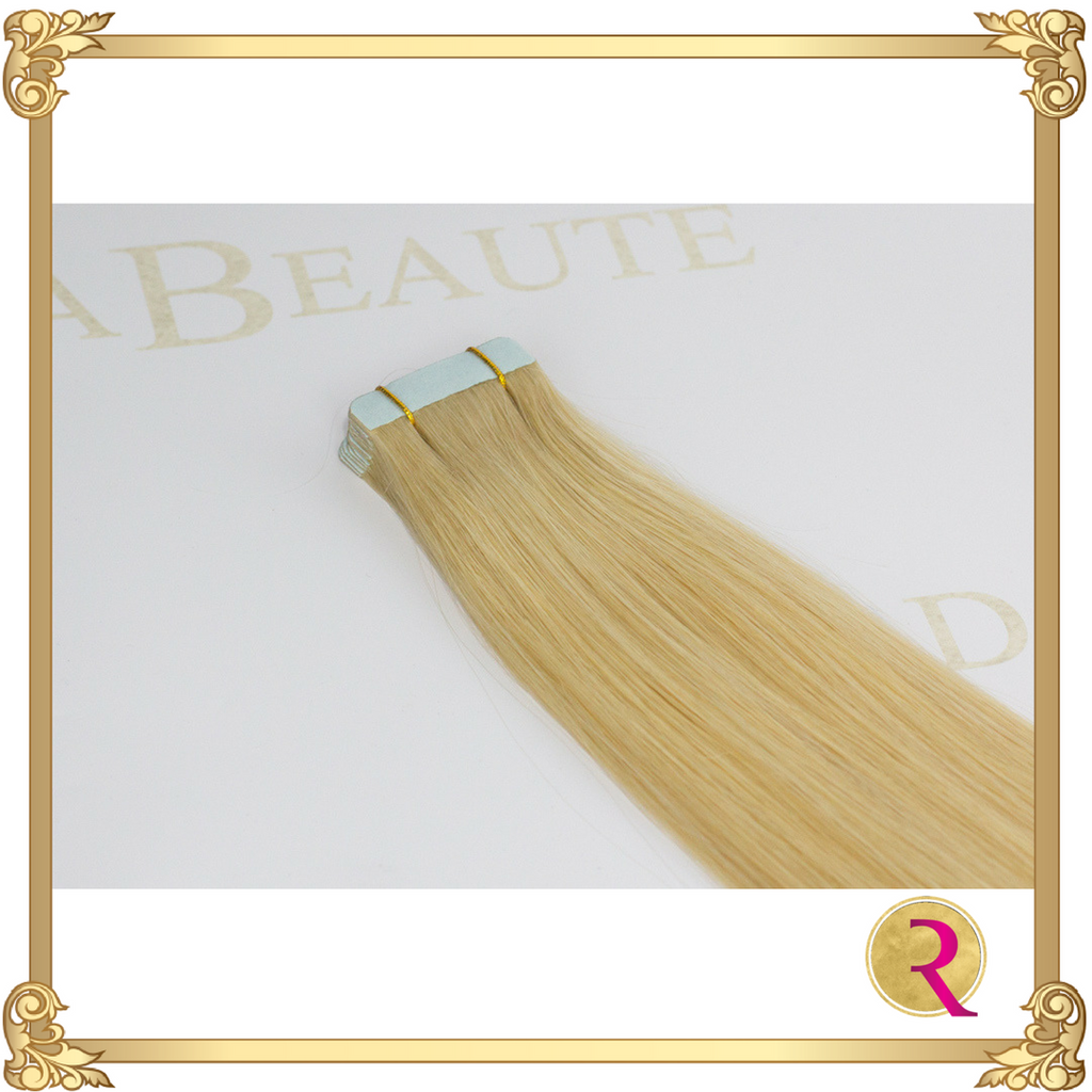 Butterscotch Blonde Tape in Extensions close up. Buy now at Rada Beaute.